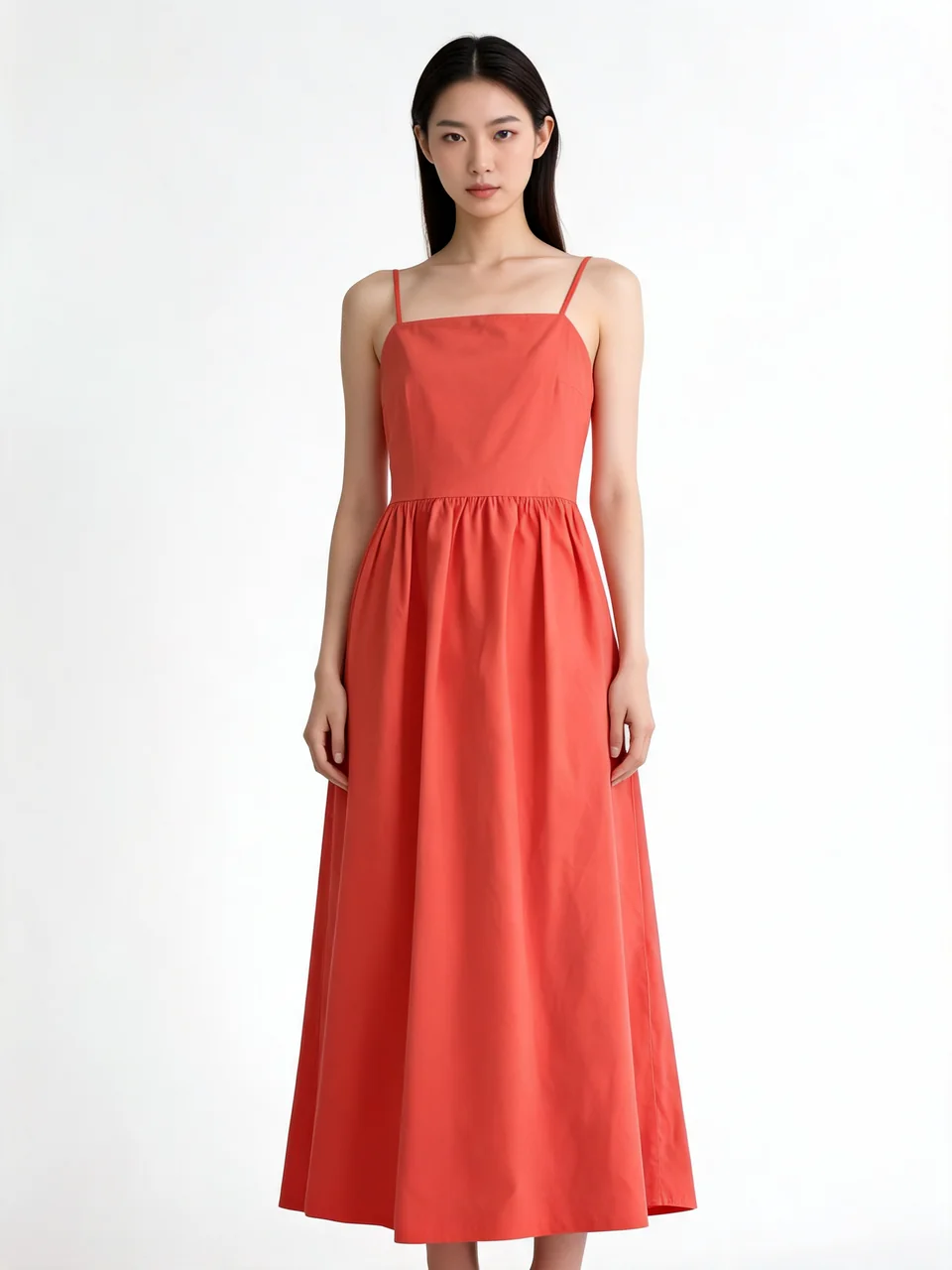 Coral red summer dress flat-lay turned into a photo of a fashion model wearing it after AI redesign